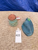 Jar with cork and matching lid displayed