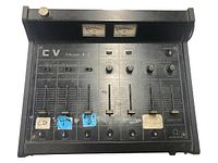 Front view of CV Model X-2 mixer showing faders, VU meters and controls