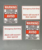 All four metal signs displayed