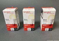 Three boxed Sengled Smart LED bulbs front view