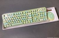 Keyboard and mouse in tray with battery