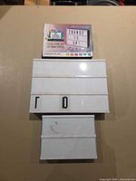 Front view showing three lightboxes and boxed unit