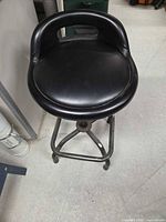Top view of padded seat and low backrest
