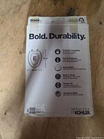 Front of sealed Kohler box showing brand, features and dimensions