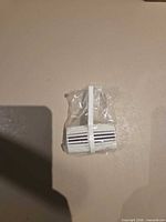 Single cleaner unit side view in plastic wrap