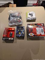 Group shot of all five boxed items on table