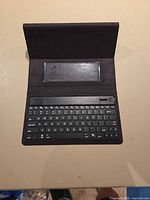 Open folio showing keyboard and interior tablet slot