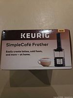 Front of box showing Keurig Simple Café Frother