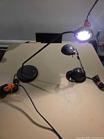 Both desk lamps on table showing size and style