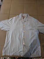 Full view of Nat Nast silk short-sleeve shirt laid flat