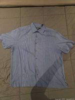 Front view of shirt laid flat