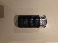 Full view of frother body showing ribbed design and Nespresso branding