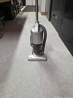 Front view of Shark stick vacuum standing upright