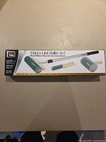 Front of box showing Total Vision Sticky Lint Roller Set