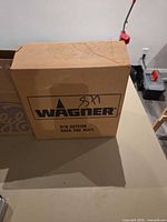 Cardboard box labeled Wagner P/N 0272129 Back Pac Accy.