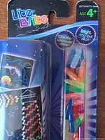 Front view of sealed Lite-Brite refill peg blister pack
