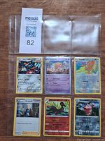 Full binder page showing all six cards