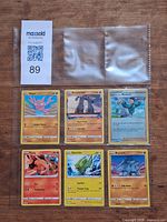Front view showing all six Pokémon cards in sleeve