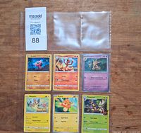 Front view of all six cards in sleeve