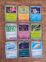 Front view of all nine cards in sleeve