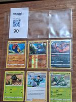 Front view of all six Pokémon cards in sleeve