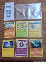 Front view of binder page showing all six cards
