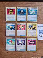 Front view of nine Pokémon cards in 3×3 layout