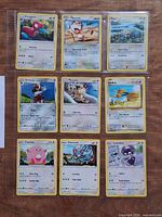 Full 9-card binder page showing all cards