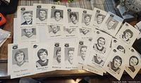 Spread of approximately 30 Montreal Canadiens player photo cards showing names and portraits