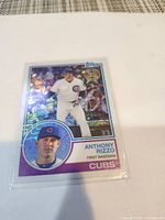 Front view of Anthony Rizzo holographic Topps card in sleeve