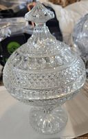 full view of covered candy dish showing pattern and pedestal