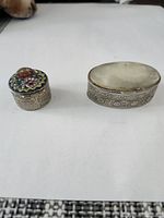 Both trinket boxes side by side showing shapes and engraved sides