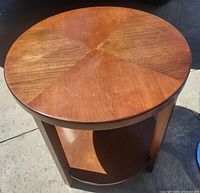Top view showing quadrant cherry veneer pattern and surface scratches