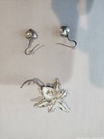 Front view showing brooch and both earrings to illustrate design and completeness