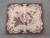 full view of rectangular floral tufted rug