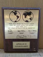 Full front view showing plaque design and text