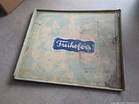 Full view of tray showing overall color, logo, and wear