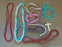 All nine jewellery pieces laid out for full view
