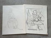 Both unframed drawings laid side by side on floor