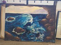Full view of seascape painting on stretched canvas