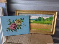 Both paintings together showing sizes and frame