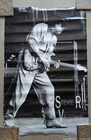 Full view of rolled-creased Stevie Ray Vaughan poster