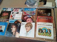 Group view of multiple LP jackets on tabletop