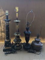 Group shot of all four lamps showing sizes and designs