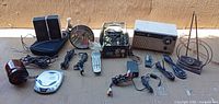 Overall lot showing radio, CD player, speakers, antenna, lamps, cables