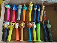 Full view of all 17 PEZ dispensers lined in box