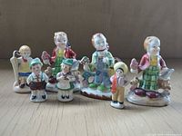 Front view of all seven figurines