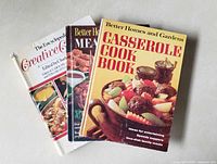Group shot of all three cookbooks showing covers