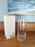 Vase standing beside original white Boda Design box