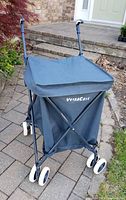 Cart assembled, front view showing brand logo, wheels, lid